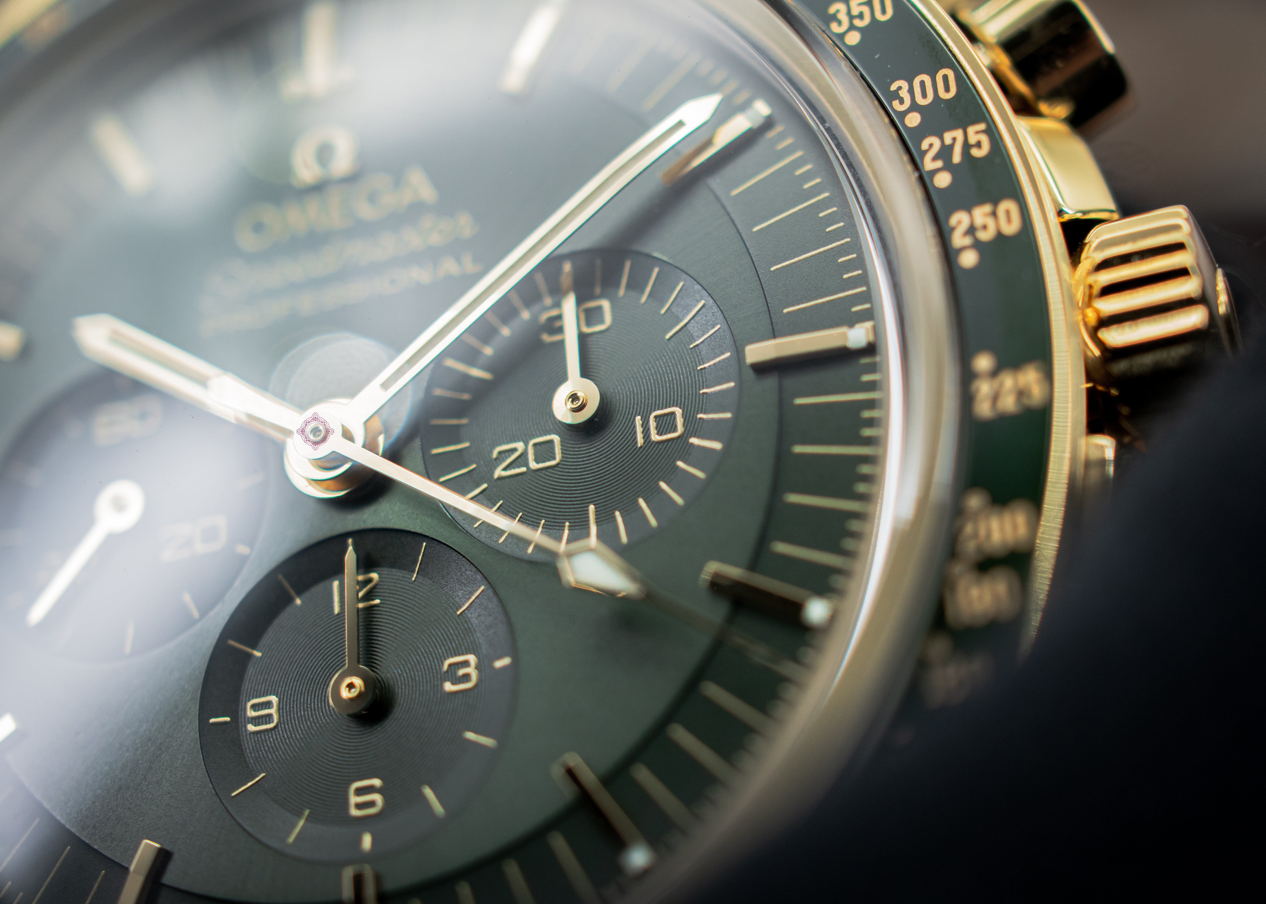 Omega Speedmaster Moonshine Gold Green Dial - 310.60.42.50.10.001